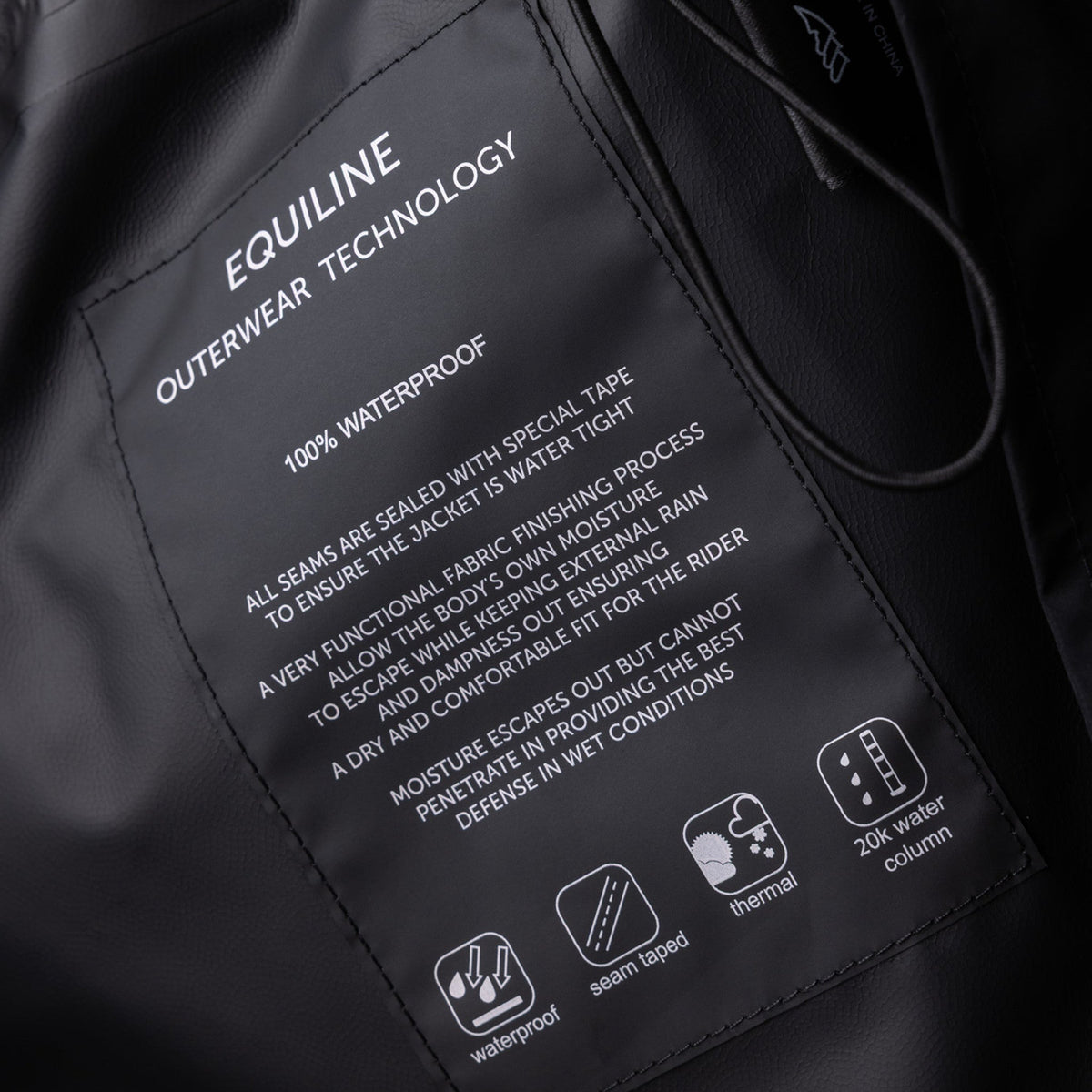 Equiline Ladies Eqextre waterproof jacket technology graphic, 100% waterproof with sealed taped seams and a 20,000mm water column.