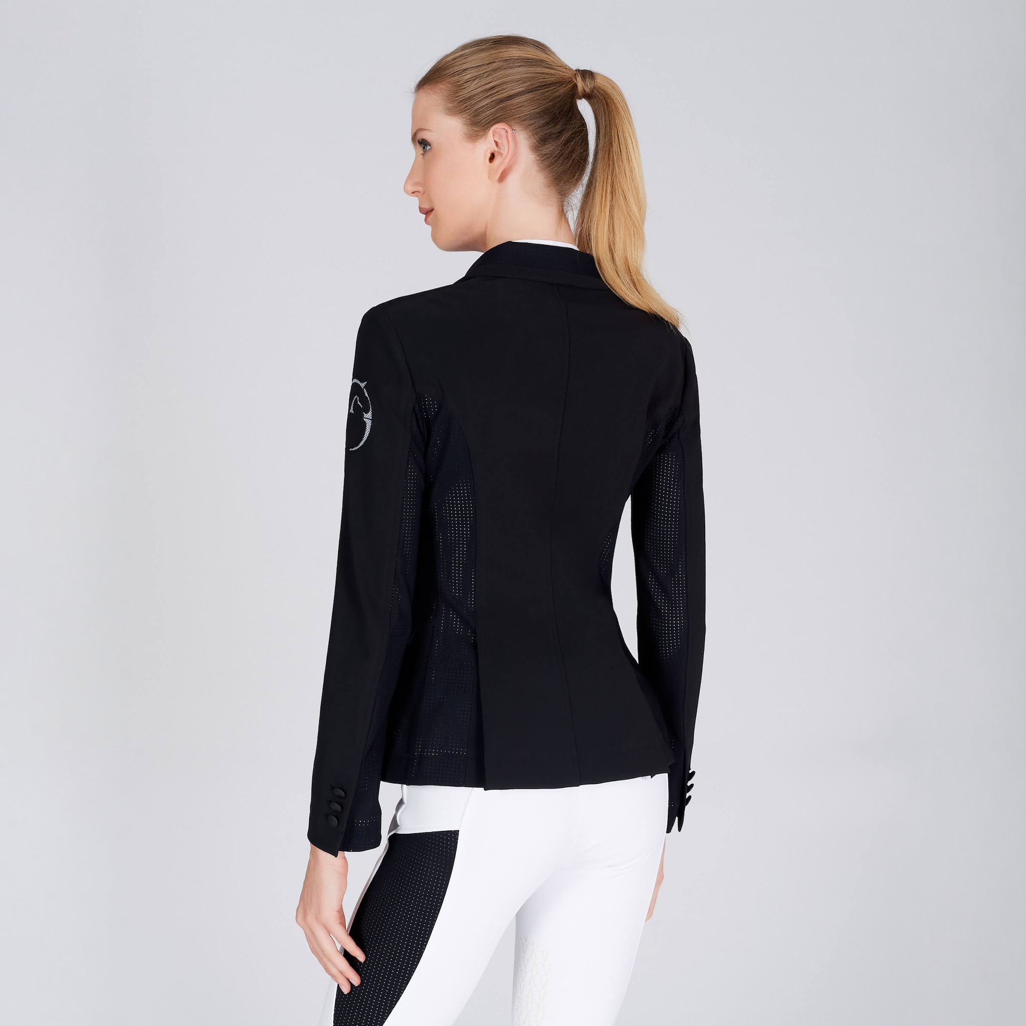 Black Vestrum Ladies Barcellona Show Jacket displayed from the back, featuring tailored design and stylish details.
