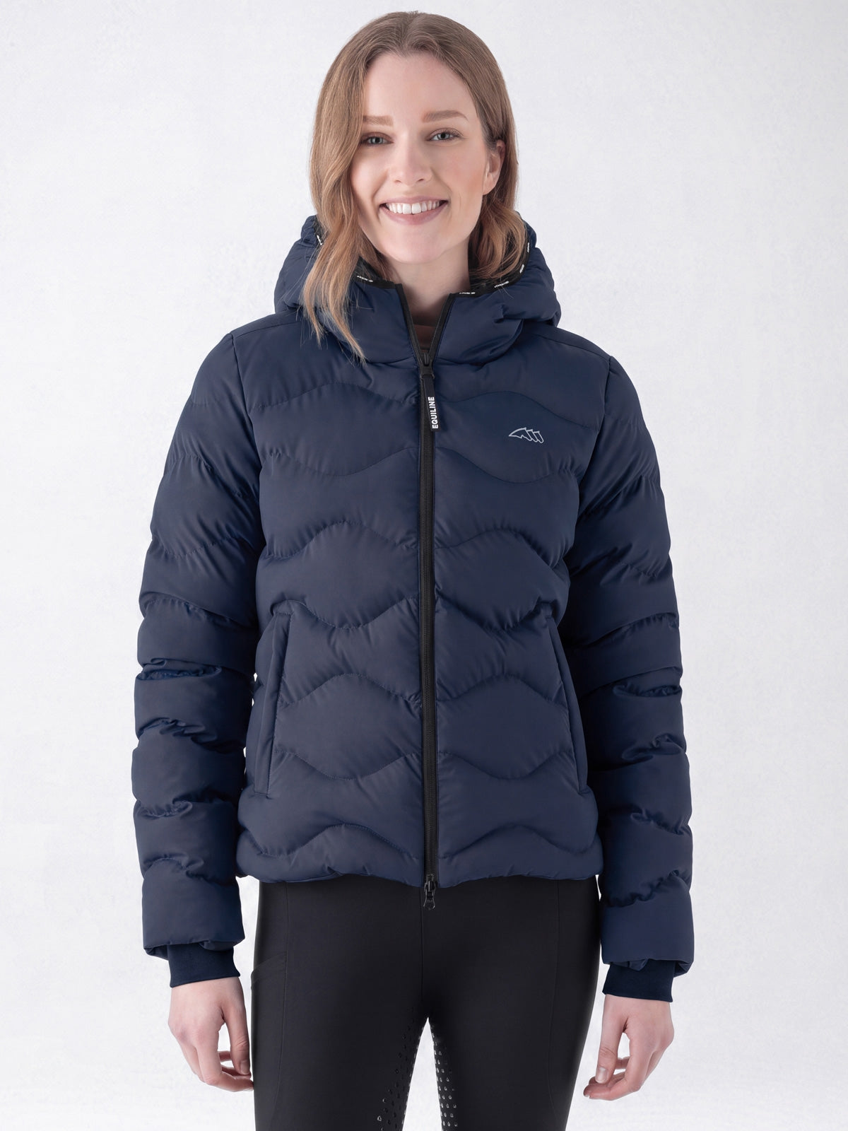 Equiline Ladies Eqcentry Padded Jacket in Blue, front view of the hooded Eco-Duvet padded jacket with printed Equiline logo on the chest.