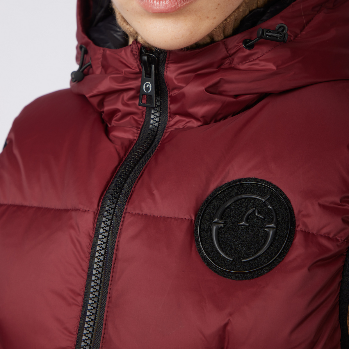 Vestrum Ladies New Jersey Vest in amaranth red, a padded equestrian body warmer ideal for layering.