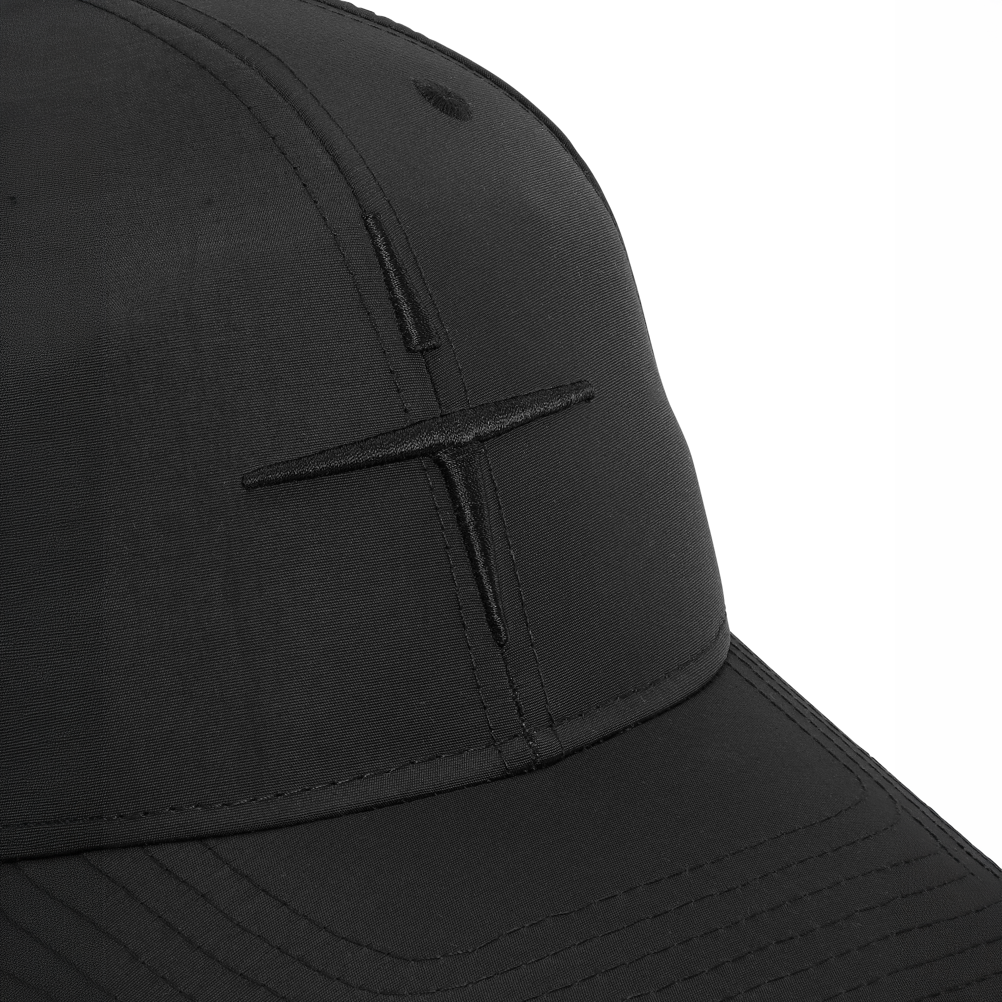 Black Trolle unisex star logo cap with adjustable strap, featuring a prominent star emblem on the front.