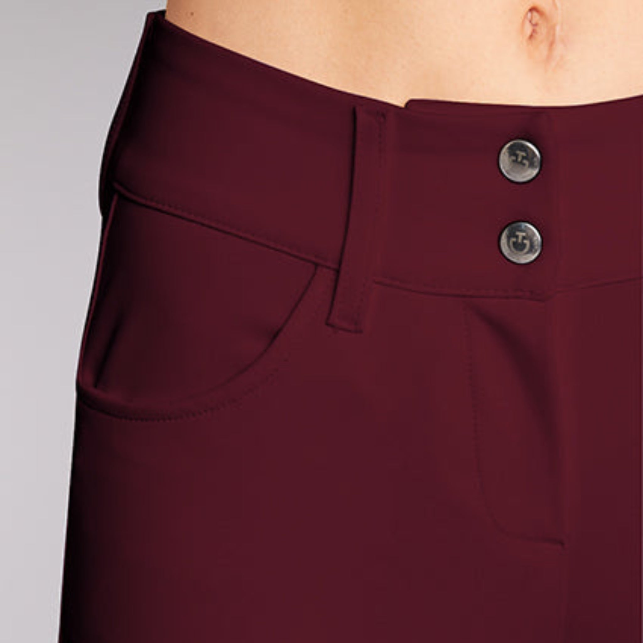 Cavalleria Toscana ladies knee grip breeches in burgundy with detailed stitching and American-inspired design for equestrian riding.