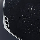 Samshield Miss Shield Shadowmatt 2.0 riding helmet with Crystal Bloom top, navy band, black chrome trim, and decorative blazon detail.