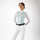 Close-up of Equiline ladies Cubra long sleeve competition show shirt, featuring a fitted design and subtle branding at the front.