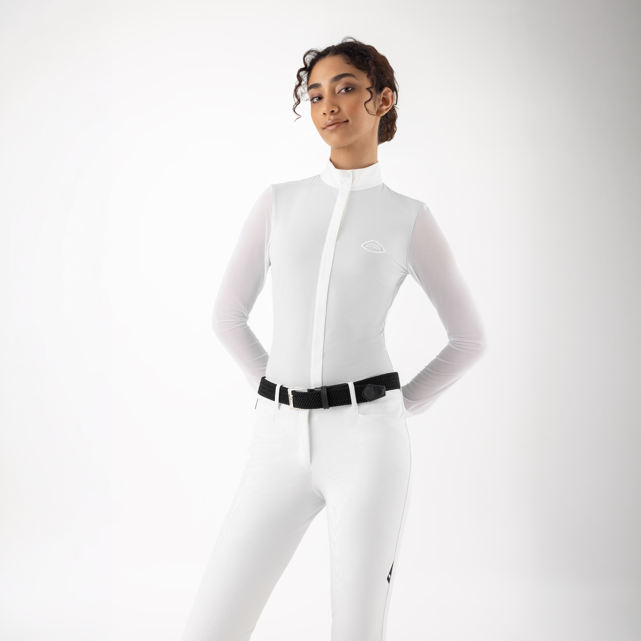 White Equiline ladies Cubra long sleeve competition shirt with front view, designed for show riding and equestrian events.
