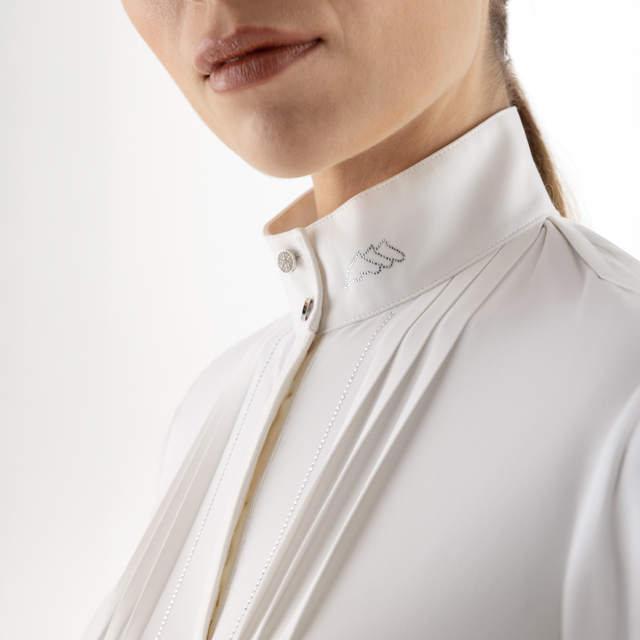 Equiline Ladies Gelsa long sleeve competition show shirt in white with detailed stitching for equestrian events.