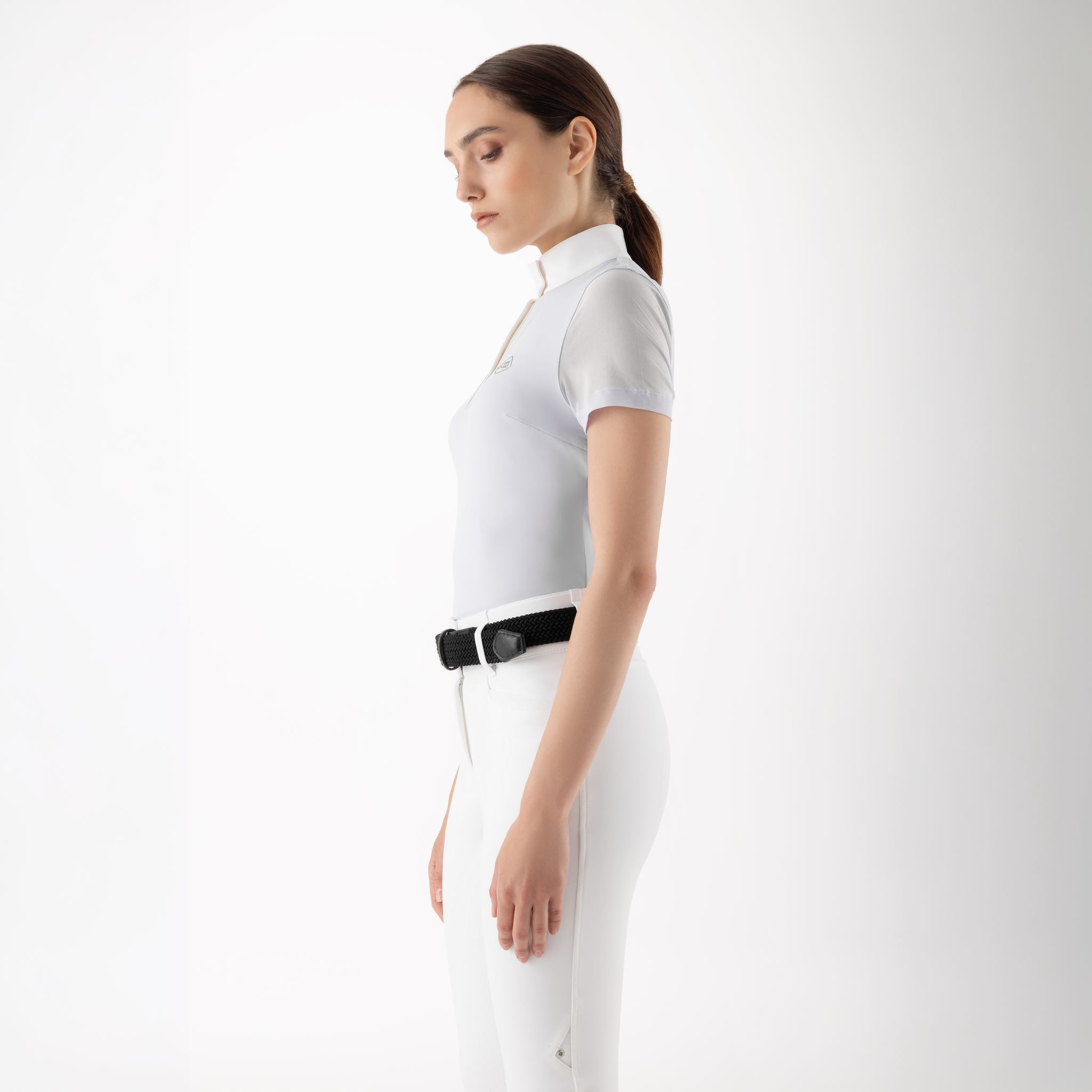 Equiline Ladies Gleece short sleeve competition shirt showing side view with breathable fabric and sleek fit for equestrian events.