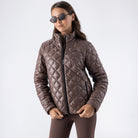 Equiline Ladies Eqplum light padded jacket in cocoa powder, front view of the quilted design with full-length zip.