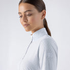 Equiline Ladies Eqtock white competition shirt, close-up of the high stand collar and zip front on breathable stretch fabric.