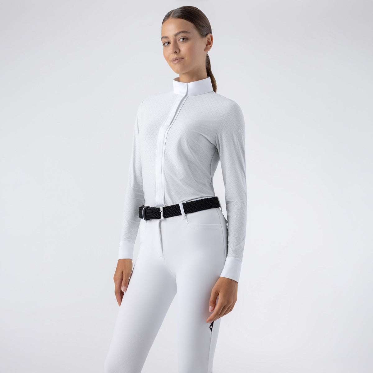 Equiline Ladies Eqtock white competition shirt detail, showing the textured tone-on-tone fabric and tailored competition fit.