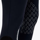 Cavalleria Toscana ladies' New Grip Supergrip breeches hanging on a display, showing the tailored riding breech with grip details.