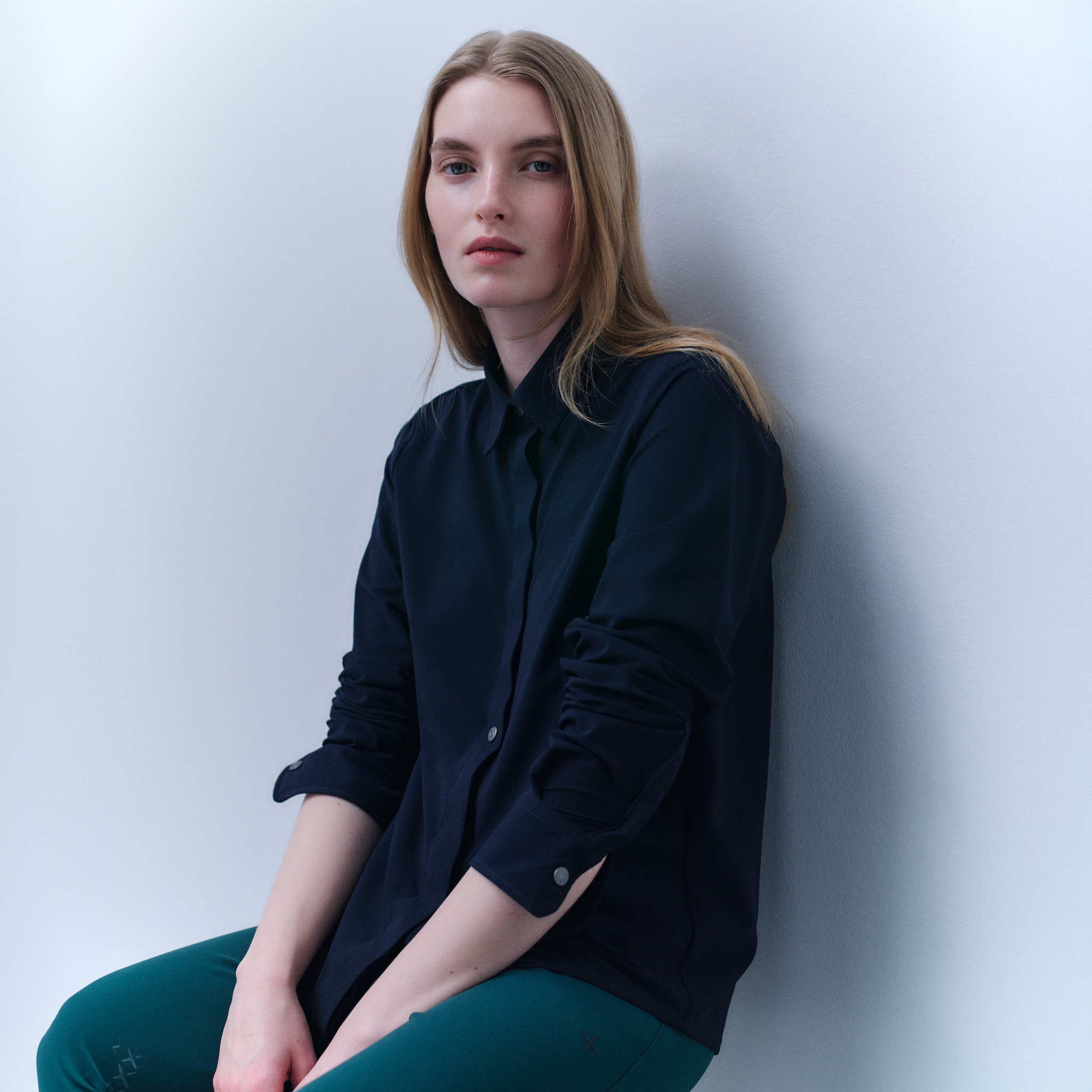 Navy Trolle Ladies casual piquet shirt featuring a classic polo style, short sleeves, and a comfortable fit.