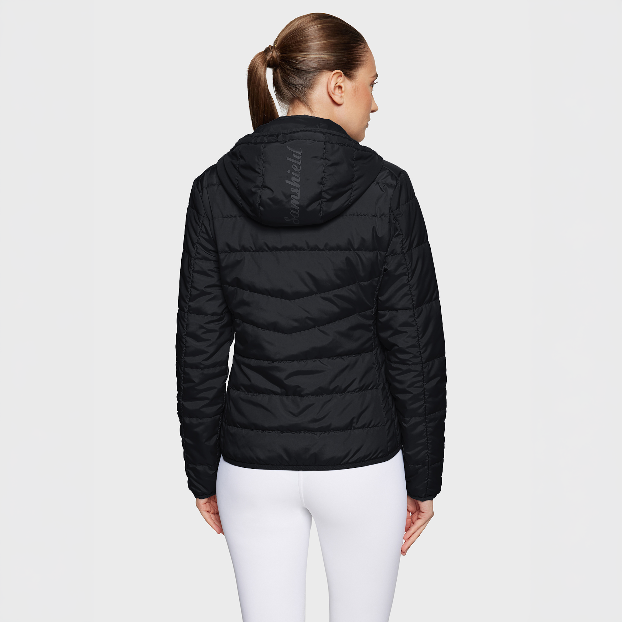Black Samshield Ladies Davos Puffer Jacket displayed from the back, showcasing its quilted design and cozy fit.