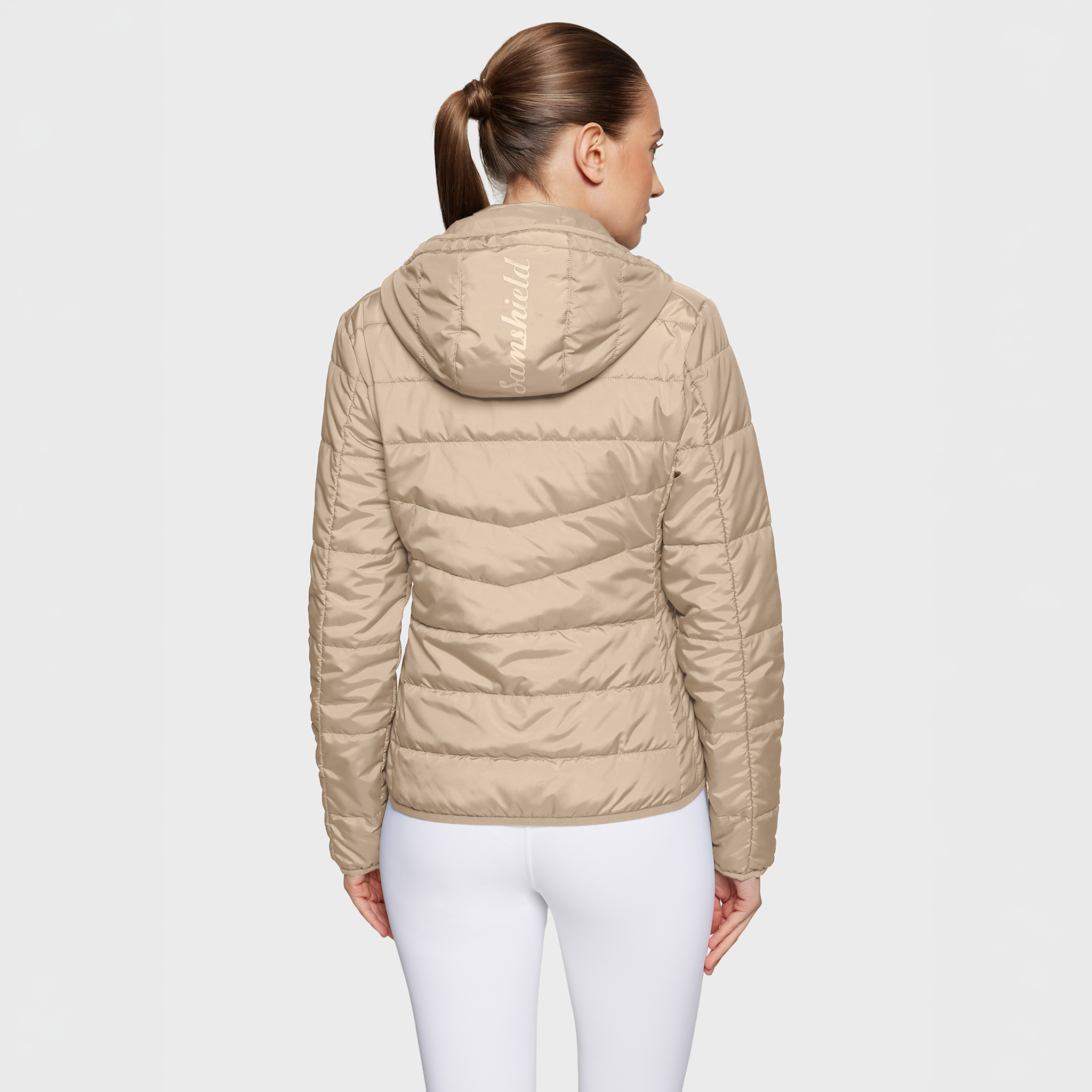 Samshield Ladies Davos Puffer Jacket in sand color, casual coat with quilted design and front zipper, viewed from the back.