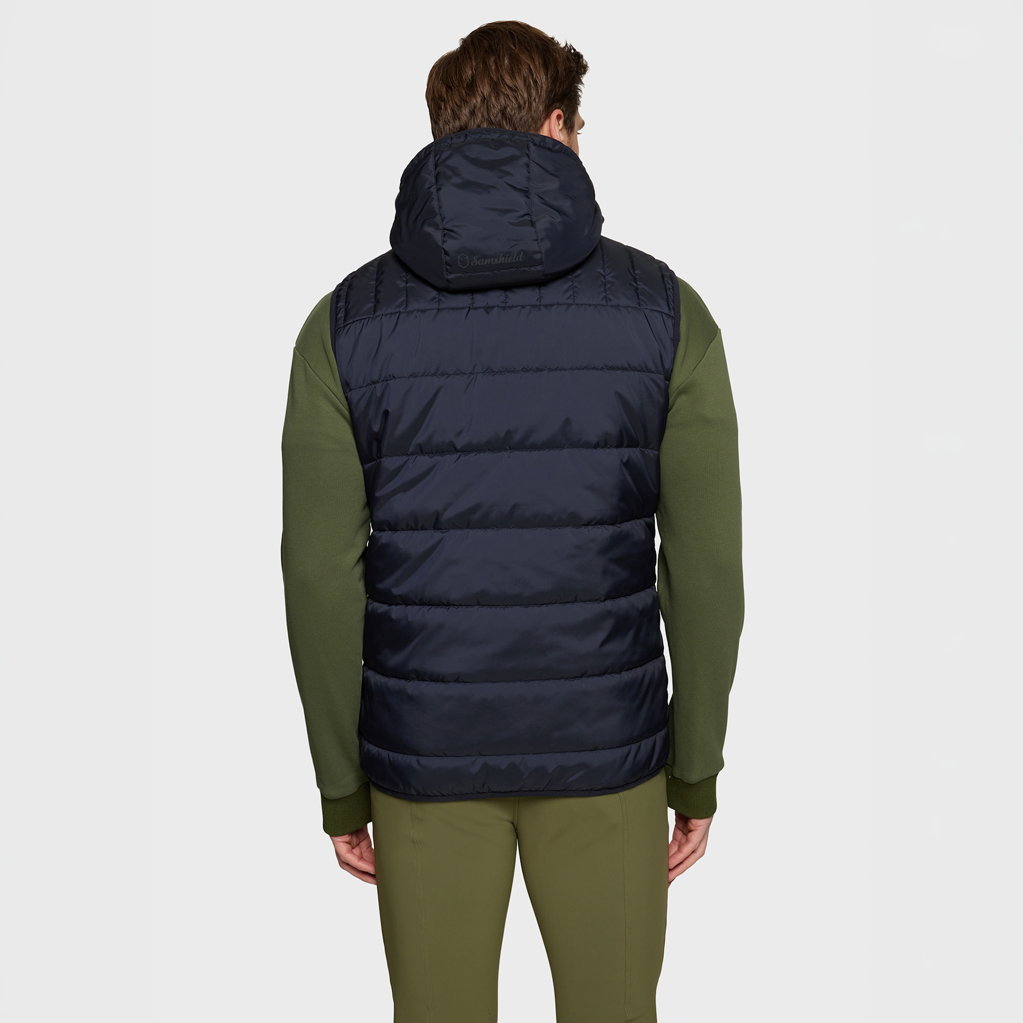 Back view of navy Samshield GSTAAD men's SS26 gilet, sleeveless vest with a high collar and sleek design.