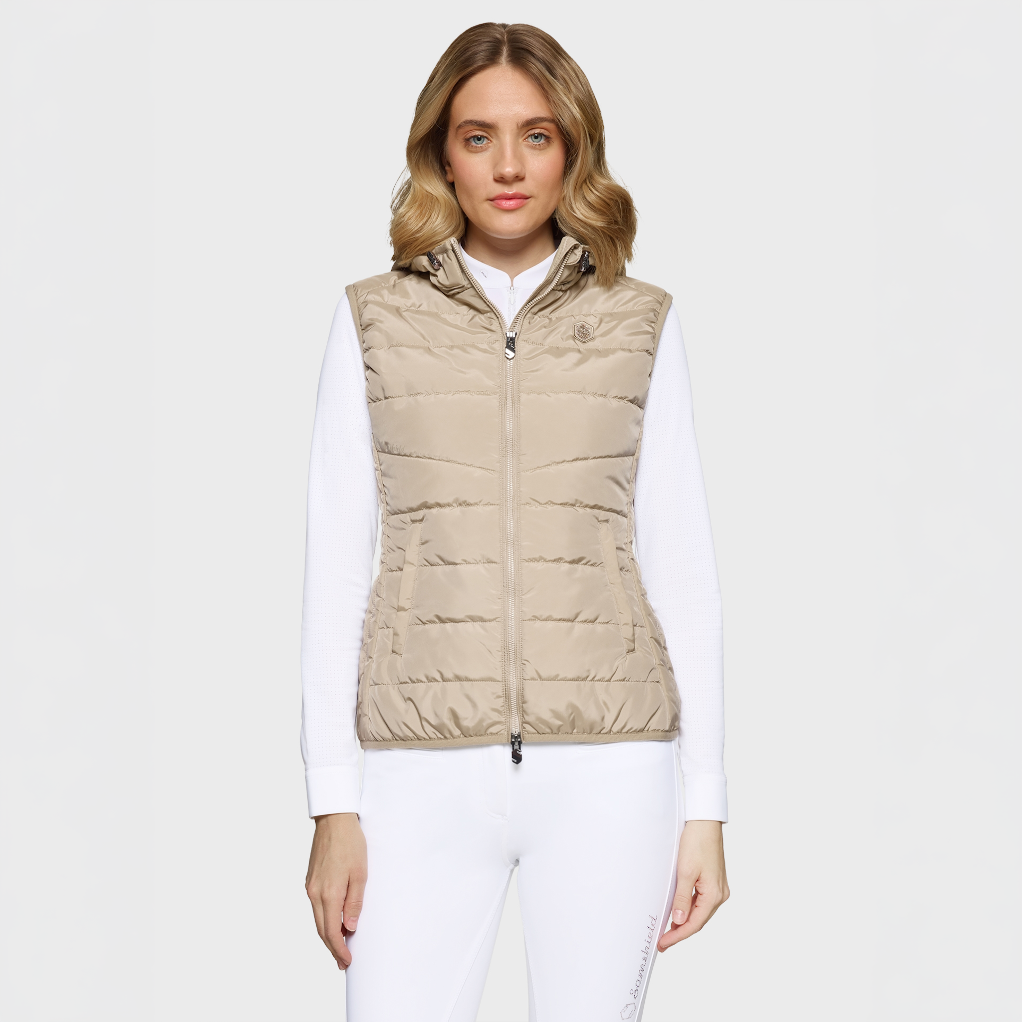 Samshield Ladies Alta Badia Gilet in sand color, lightweight vest with sleek design and front zipper, suitable for riding or outdoor wear.