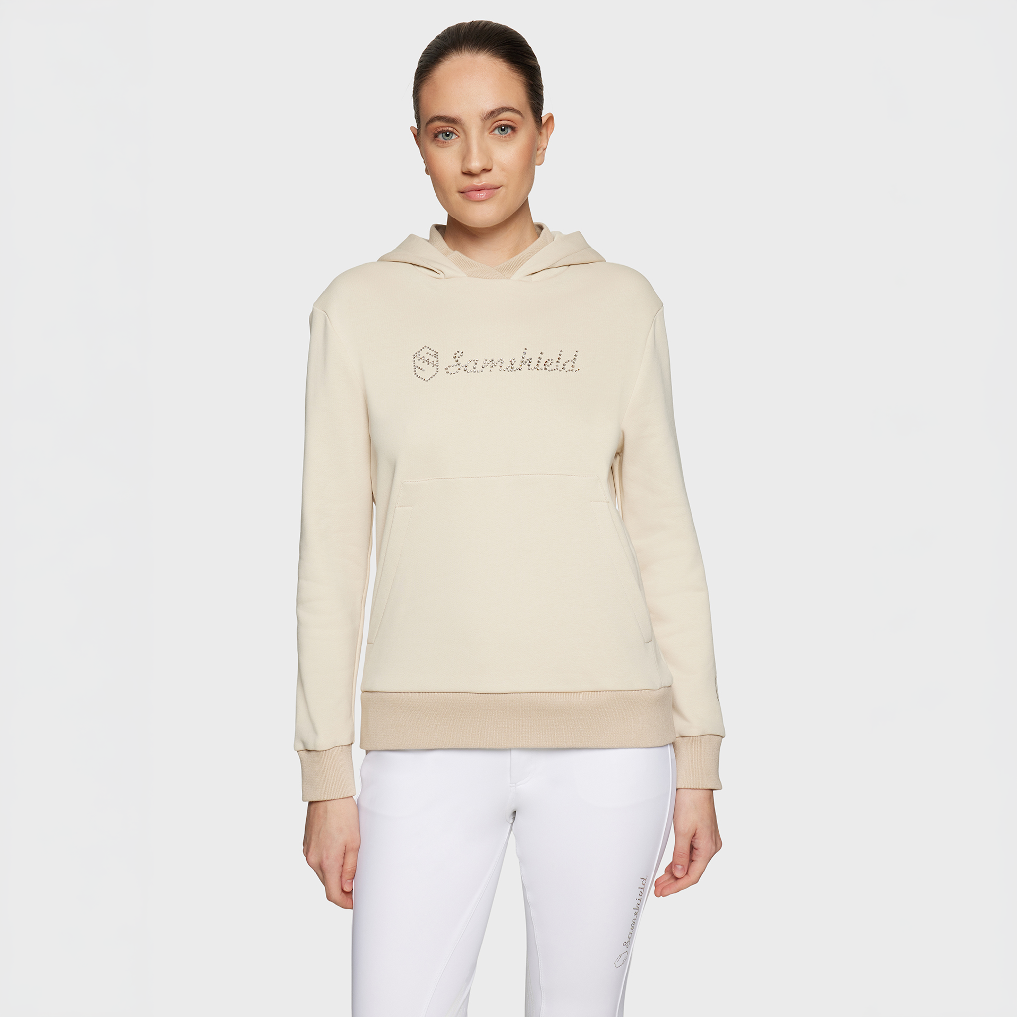 Beige Samshield Ladies SS26 Camilla hoodie with a casual fit, featuring a hood and soft fabric for comfortable everyday wear.