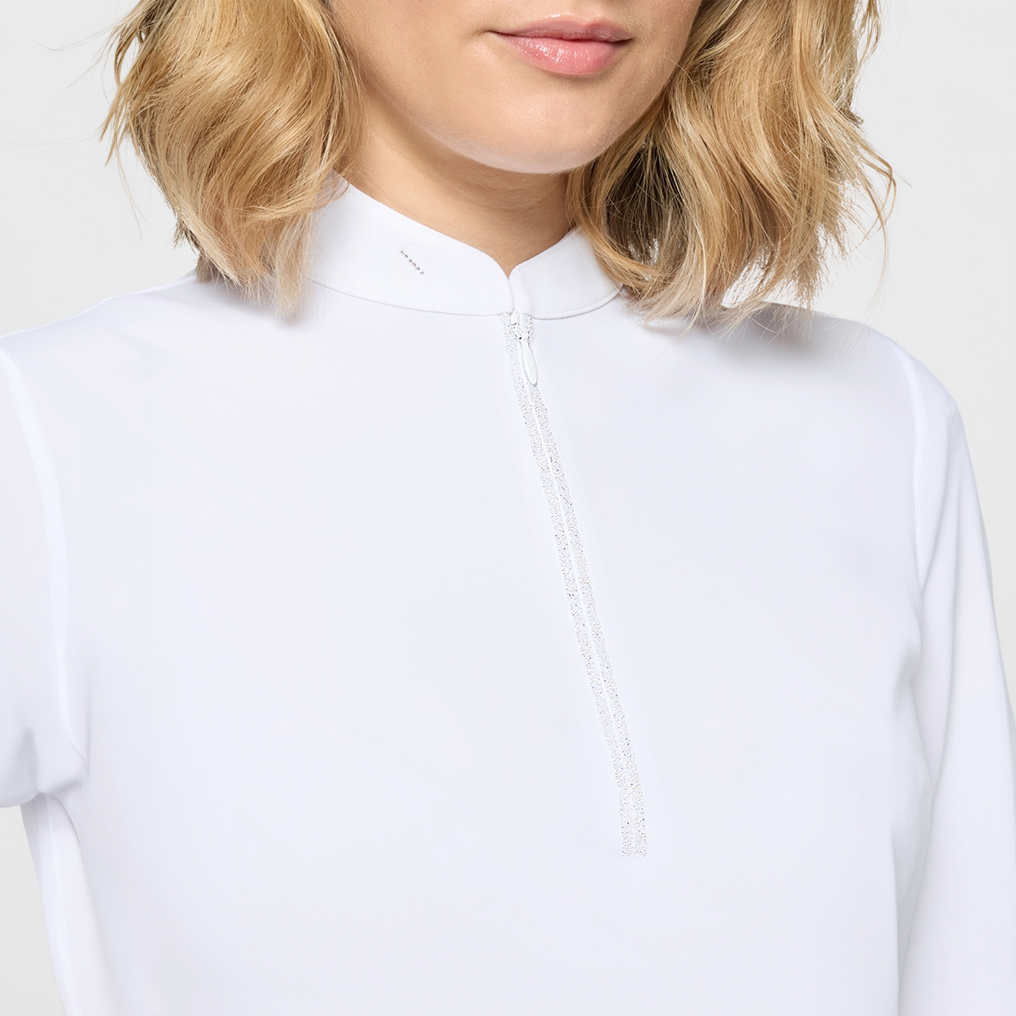 Samshield Ladies SS26 Aloise short sleeve show shirt in white with elegant details, designed for equestrian competition.