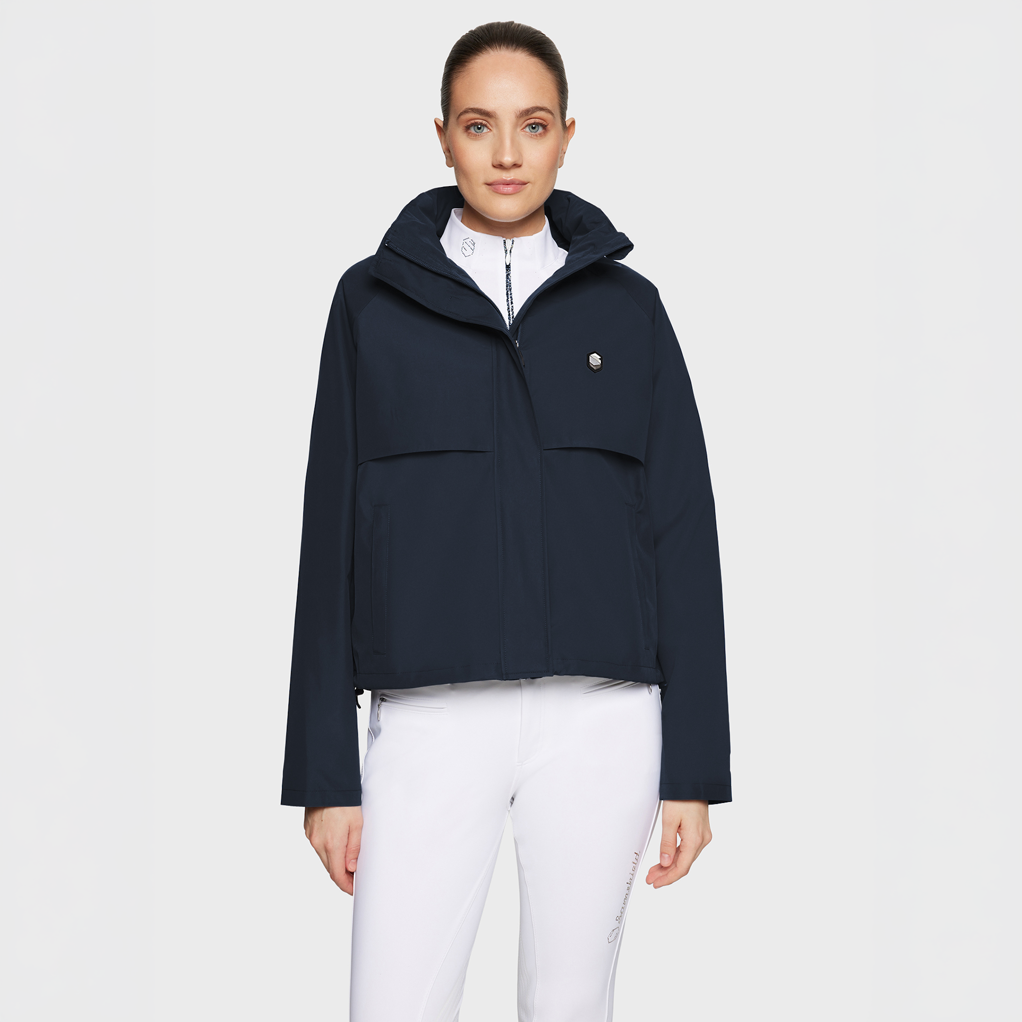 Samshield Ladies SS26 Lina navy waterproof rain coat showing a stylish casual jacket with a hood and zip closure.