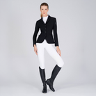 Black Vestrum Ladies Barcellona Show Jacket displayed on a hanger, showcasing its tailored design and high-quality fabric.