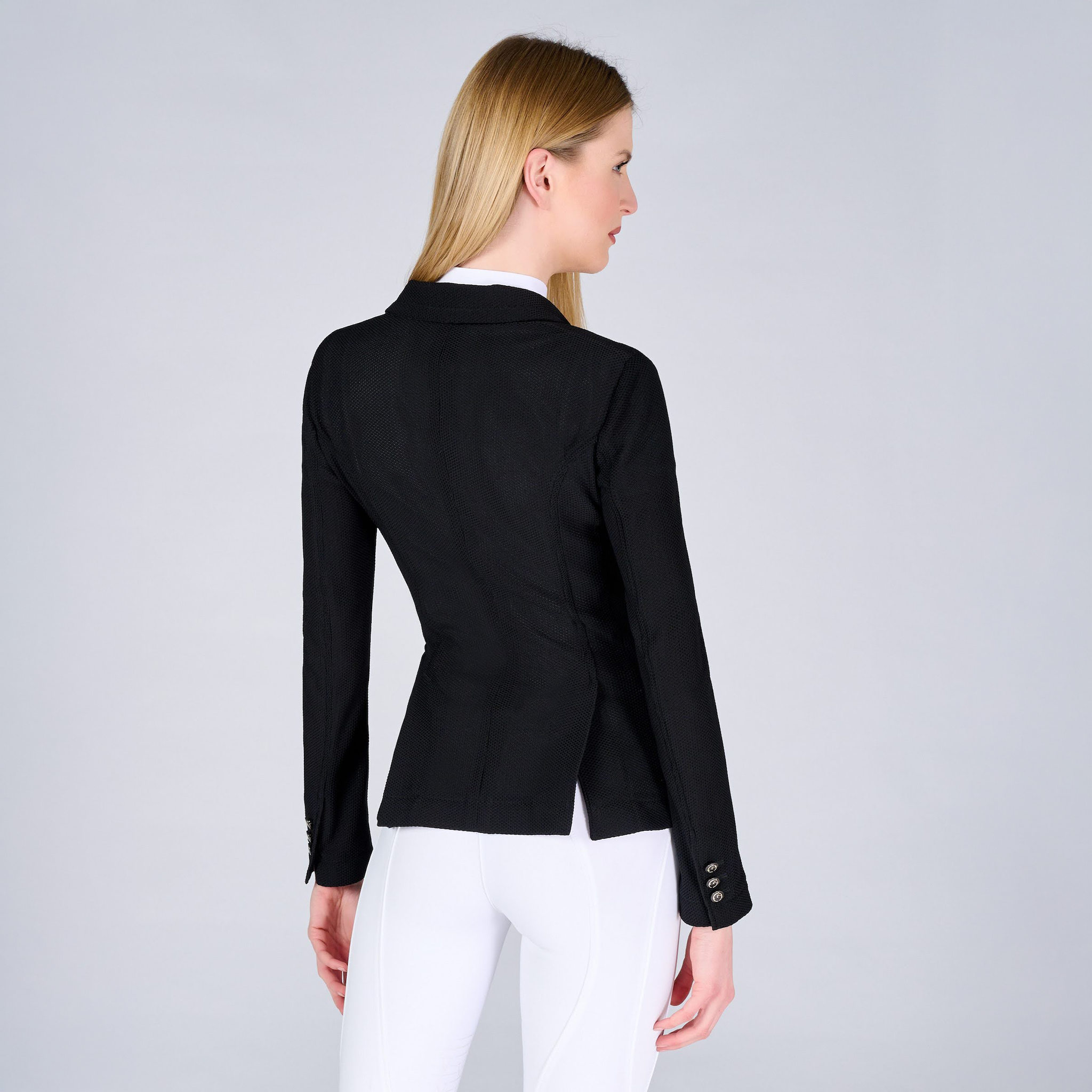 Black Vestrum Ladies Valencia Show Jacket displayed from the back, showcasing tailored fit and elegant design for equestrian events.