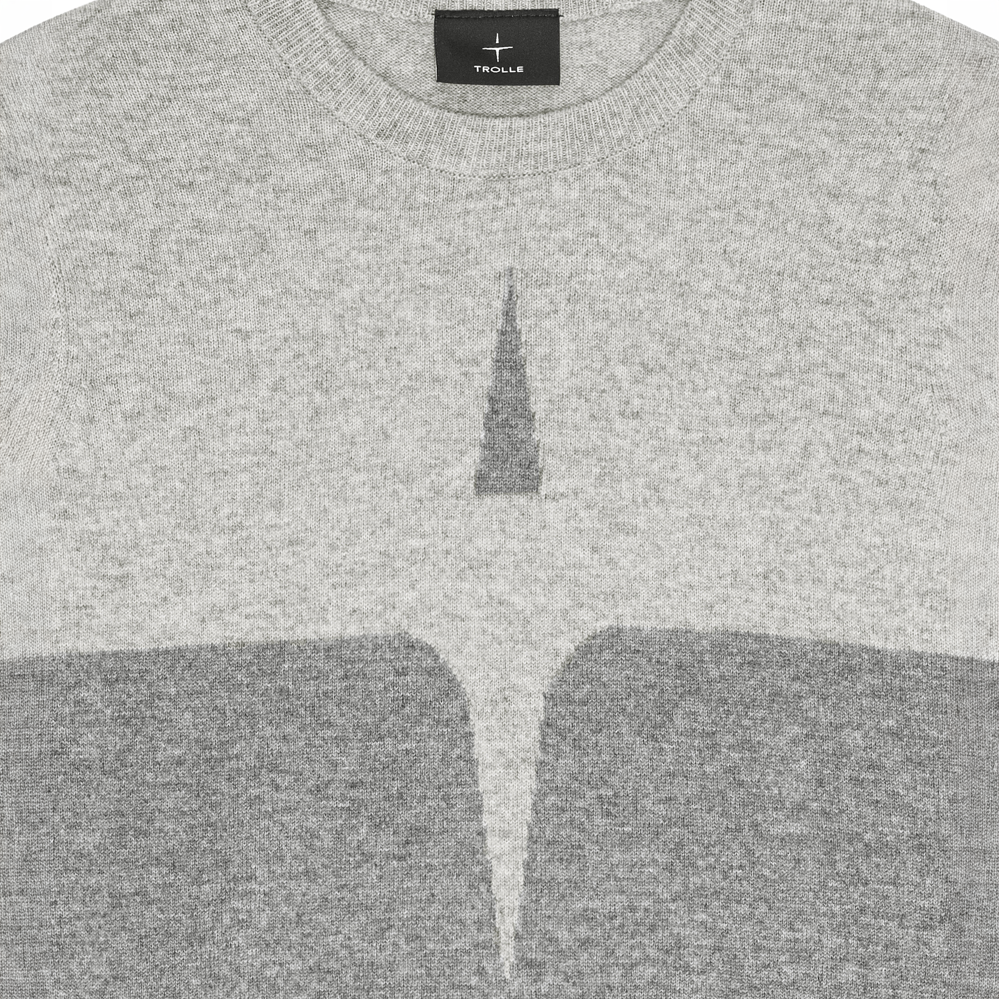 Trolle Ladies cashmere and wool star logo crewneck sweater in grey, featuring a cozy casual design with a star emblem on the front.