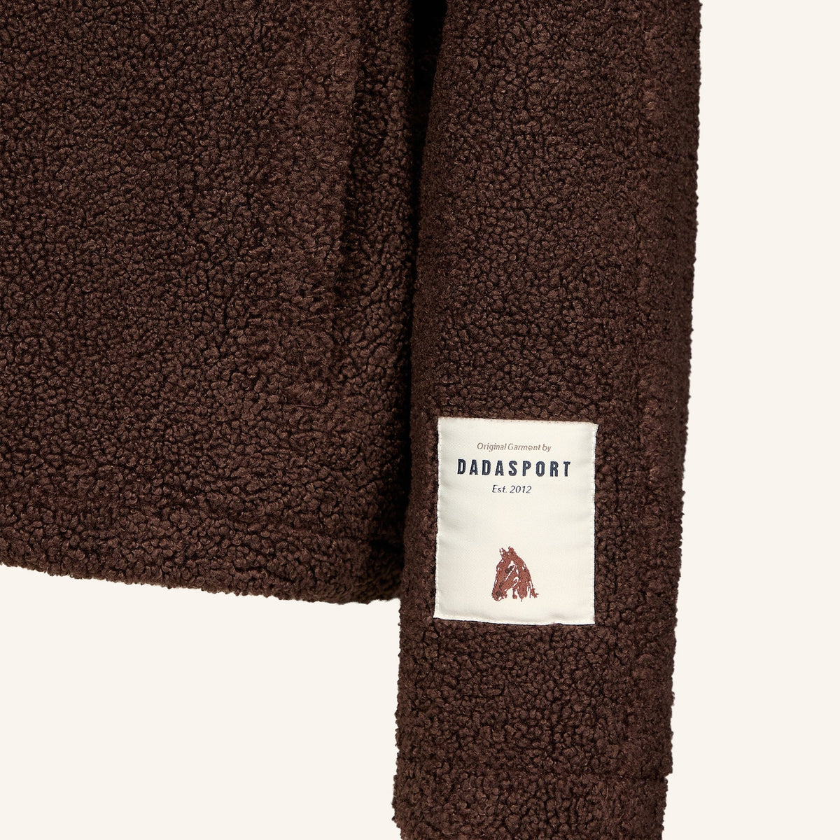 Dada Sport Ladies Tabalou Fleece in Brown, close-up of the hem and Dada Sport label