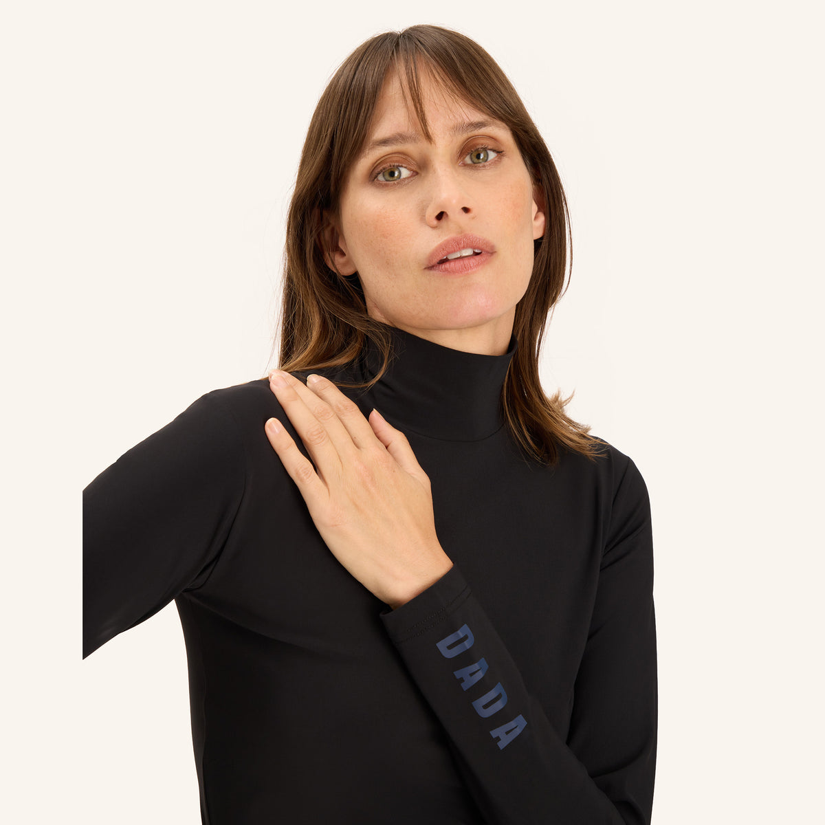 Dada Sport Ladies Consul Technical Riding Turtle-Neck in Midnight Blue, collar and sleeve logo detail
