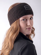 Equiline Ladies Eqcend Knitted Headband in Coffee Bean, front view of the microfleece-lined knitted headband with jacquard Equiline logo patch.