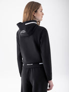 Equiline Ladies Eqcetir Soft Tech Full Zip Hooded Sweatshirt in Black, back view of the soft-touch full zip hooded sweatshirt with two-way zip and printed Equiline logo.
