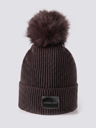 Equiline Ladies Eqcon Pom Pom Knitted Hat in Coffee Bean, front view of the microfleece-lined knitted beanie with faux fur pom pom and Equiline logo patch.
