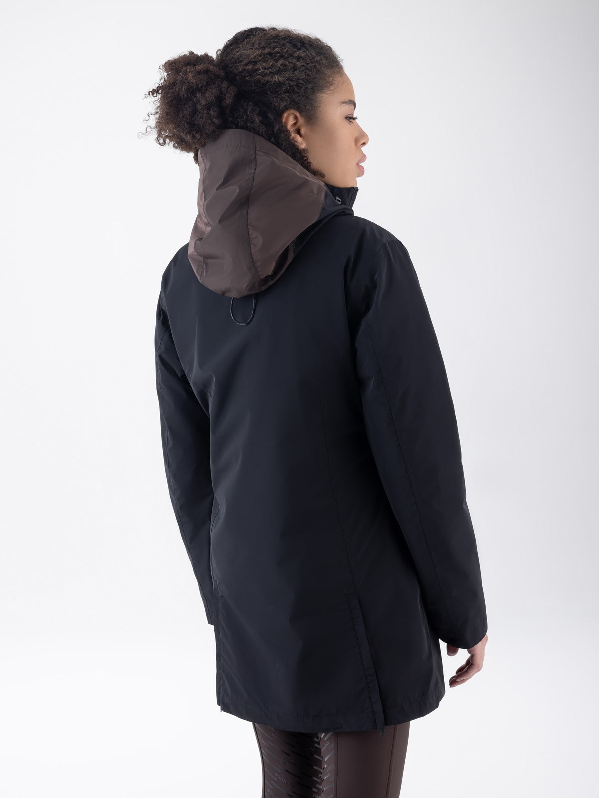 Equiline Ladies Eqcroof 3 in 1 Waterproof Jacket in Black, detail view of the 3-in-1 waterproof jacket with detachable outer shell and Eco-Duvet inner jacket.