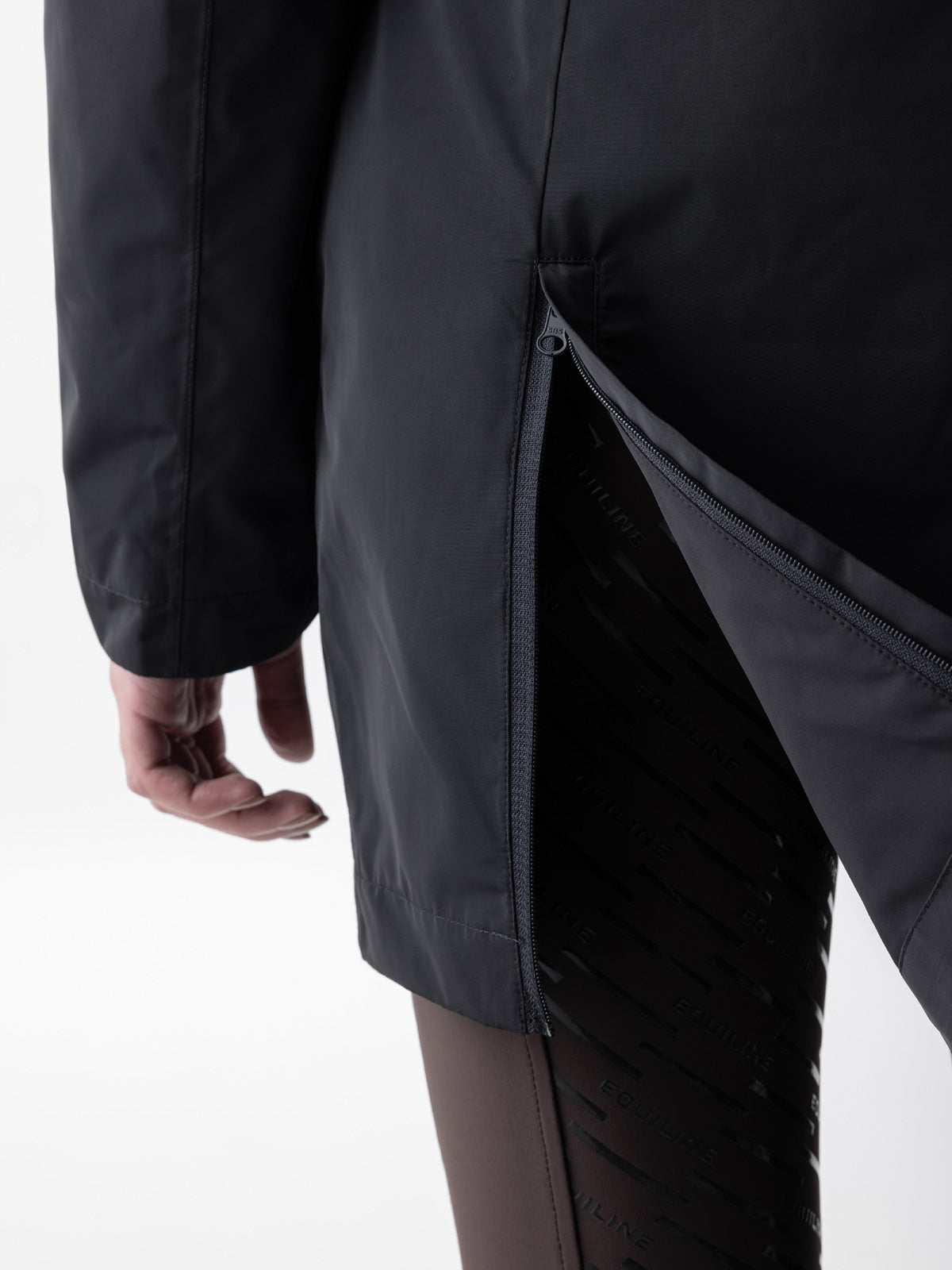 Equiline Ladies Eqcroof 3 in 1 Waterproof Jacket in Black, detail view of the 3-in-1 waterproof jacket with detachable outer shell and Eco-Duvet inner jacket.