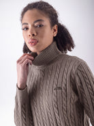 Equiline Ladies Eqlover High Neck Jumper in Greige, front view of the soft-touch high neck jumper with beige embroidered Equiline logo.