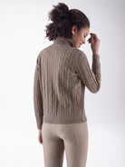 Equiline Ladies Eqlover High Neck Jumper in Greige, detail view of the soft-touch high neck jumper with beige embroidered Equiline logo.