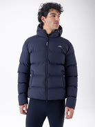 Equiline Mens Eqcan Padded Jacket in Blue, front view of the hooded Eco-Duvet padded jacket with two-way zip and Equiline logo tape.