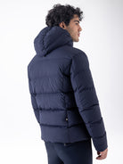 Equiline Mens Eqcan Padded Jacket in Blue, back view of the hooded Eco-Duvet padded jacket with two-way zip and Equiline logo tape.
