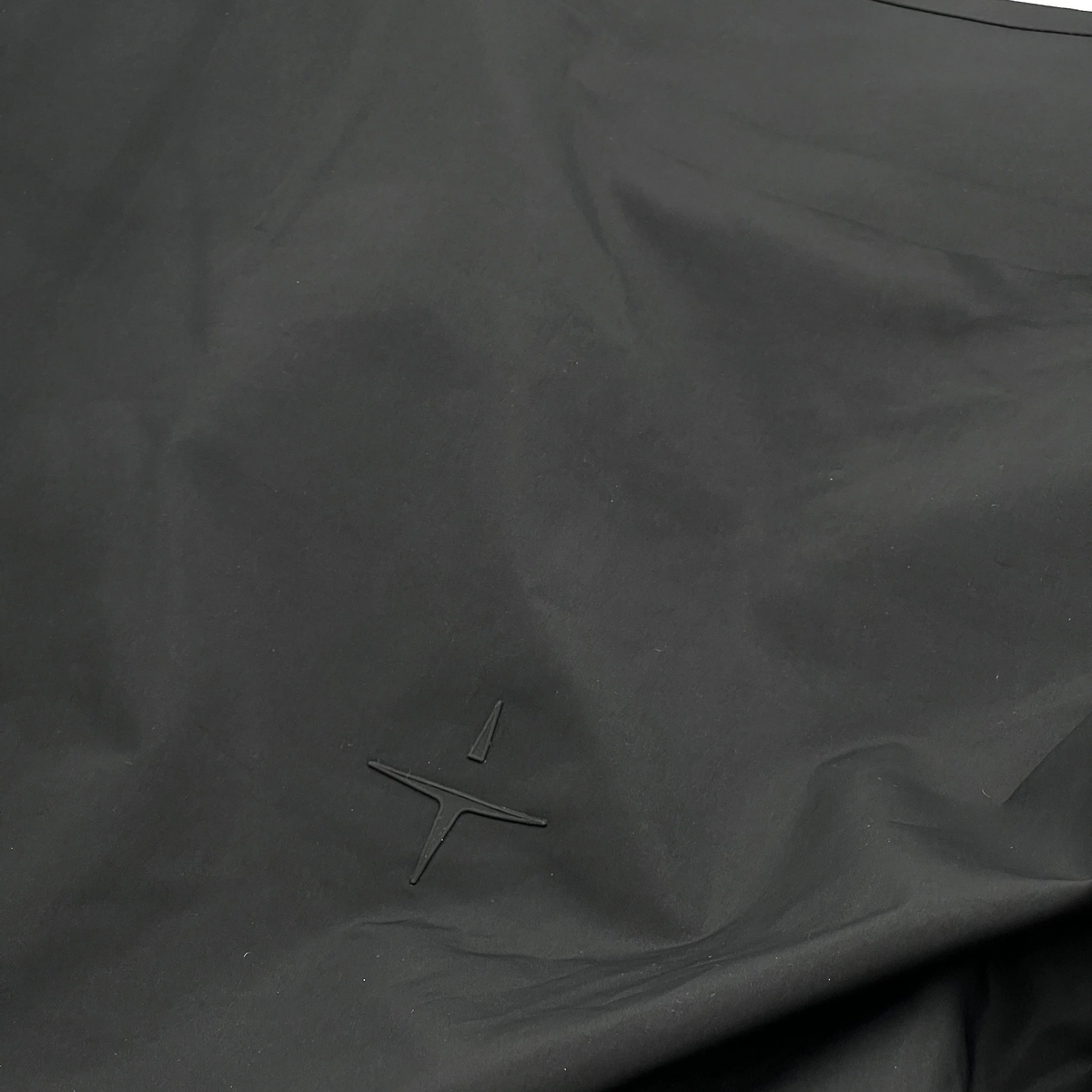 Trolle Ladies Heat-Sealed Breathable Rain Coat in Black, a lightweight waterproof riding coat.